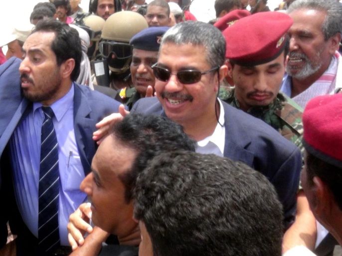 Yemen's exiled Vice President and Prime Minister Khaled Bahah (C) arrives at Aden airport in the southern port city of Aden, Yemen, 01 August 2015. Yemen's exiled Vice President and Prime Minister Khaled Bahah arrived on 01 August in Aden, four months after his government was forced to flee the southern city by Iran-backed rebels. The visit comes more than two weeks after Saudi-backed fighters loyal to exiled President Abdo Rabbo Mansour Hadi regained control of Aden from Houthi rebels, in a major setback for the rebels. EPA/STR BEST QUALITY AVAILABLE