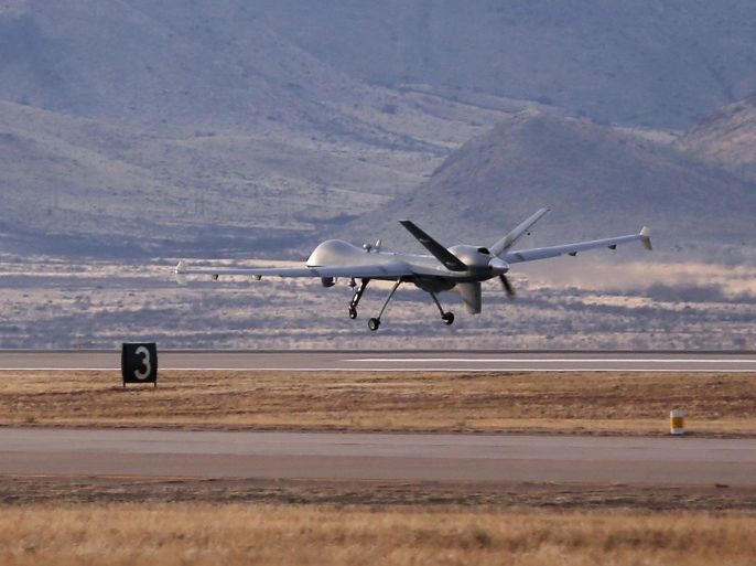 SIERRA VISTA, AZ - MARCH 07: A Predator drone operated by U.S. Office of Air and Marine (OAM), takes off for a surveillance flight near the Mexican border on March 7, 2013 from Fort Huachuca in Sierra Vista, Arizona. The OAM, which is part of U.S. Customs and Border Protection, flies the unmanned - and unarmed - MQ-9 Predator B aircraft an average of 12 hours per day at around 19,000 feet. The drones, piloted from the ground, search for drug smugglers and immigrants crossing illegally from Mexico into the United States.