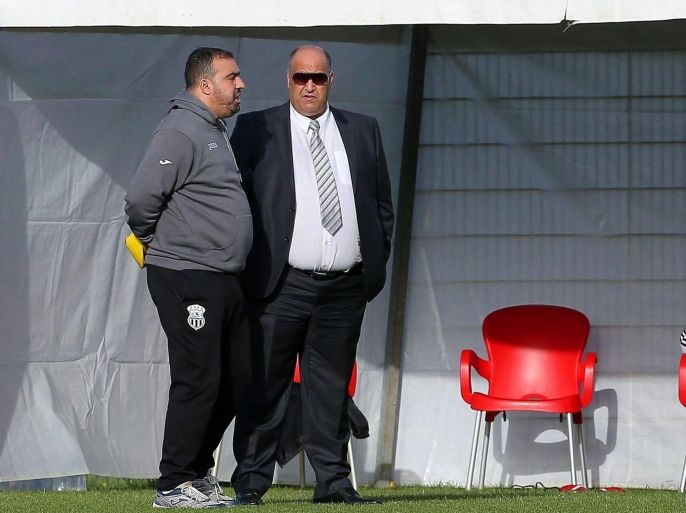 ES Setif President Hassan Hamar (R) and head coach Kheireddine Madoui (L) attend their team's training session in Rabat, Morocco, 12 December 2014. ES Setif will face Auckland City FC in the FIFA Club World Cup quarter final soccer match on 13 December 2014.
