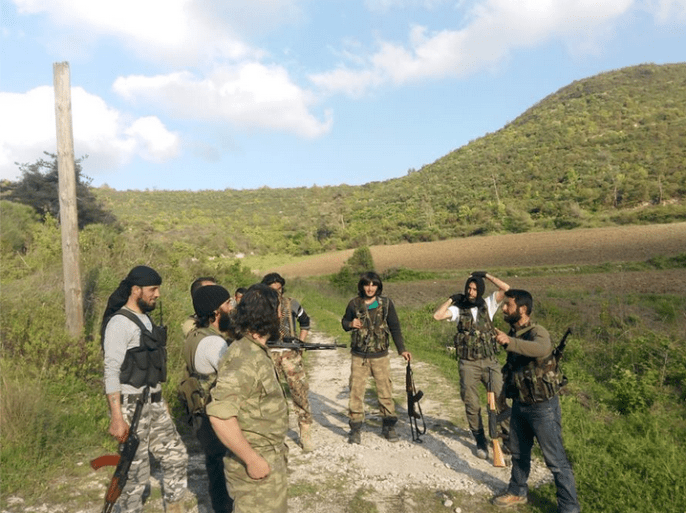 عناصر من المعارضة السورية المسلحة في جبل التركمان في ريف اللاذقية غربي سوريا