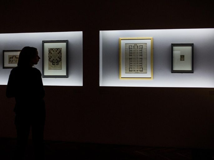 MEXICO CITY, MEXICO - JULY 13: A woman looks at the drawings by Michelangelo Buonarroti is seen during the media tour for an exhibition in Mexico City, Mexico on July 13, 2015. The Palacio de Bellas Artes in the Historic Center of the Mexican capital plays host to two exhibitions, featuring pieces that have never before been displayed in Latin America: 'Michelangelo Buonarroti: An Artist between two Worlds' and 'Leonardo Da Vinci and the idea of Beauty.'