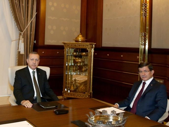 A handout picture provided by Turkish President Press office shows, Turkish President Recep Tayyip Erdogan (L) and Turkish Prime Minister Ahmet Davutoglu (R) during their meeting in Ankara, Turkey, 20 August 2015. EPA/TURKISH PRESIDENT PRESS OFFICE / HANDOUT
