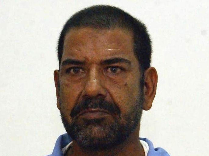 Watban Ibrahim al-Hassan, Saddam's half brother and presidential adviser, appears before the Special Tribunal Investigative Judicial Committee in Iraq in this June 26, 2005 handout photo. The U.S. military has delivered two of Saddam Hussein's half-brothers and his former defence minister Sultan Hashim into Iraqi custody along with nearly 200 other inmates at a Baghdad prison, a deputy justice minister said on July 15, 2011. Saddam's half-brothers, Sabaawi Ibrahim al-Hassan and Watban Ibrahim al-Hassan, and Sultan Hashim all face death sentences.
