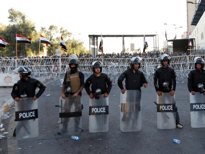 قوات الأمن فرضت إجراءات أمنية مشددة في محيط ساحة التحرير وسط بغداد (أسوشيتد برس)