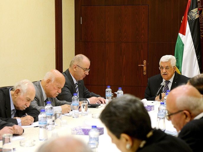 RAMALLAH, WEST BANK - APRIL 18: Palestinian President Mahmoud Abbas (4th L) chairs the PLO executive committee meeting in Ramallah, West Bank on April 18, 2014.