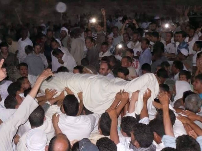 صورة لجانب من جنازة عبد السلاح حتيته أحد ضحايا عملية التصفية في الفيوم