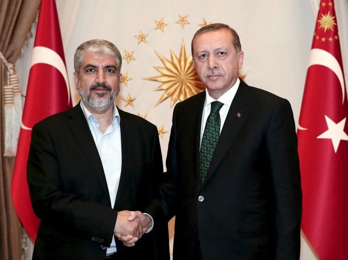 Turkey's Presdient Tayyip Erdogan (R) meets with Hamas leader Khaled Meshaal in Ankara, Turkey, in this August 12, 2015 handout provided by Presidential Palace Press Office. REUTERS/Murat Cetinmuhurdar/Presidential Palace Press Office/Handout via ReutersATTENTION EDITORS - THIS PICTURE WAS PROVIDED BY A THIRD PARTY. REUTERS IS UNABLE TO INDEPENDENTLY VERIFY THE AUTHENTICITY, CONTENT, LOCATION OR DATE OF THIS IMAGE. THIS PICTURE IS DISTRIBUTED EXACTLY AS RECEIVED BY REUTERS, AS A SERVICE TO CLIENTS. FOR EDITORIAL USE ONLY. NOT FOR SALE FOR MARKETING OR ADVERTISING CAMPAIGNS. NO SALES. NO ARCHIVES. THIS IMAGE HAS BEEN SUPPLIED BY A THIRD PARTY. IT IS DISTRIBUTED, EXACTLY AS RECEIVED BY REUTERS, AS A SERVICE TO CLIENTS.
