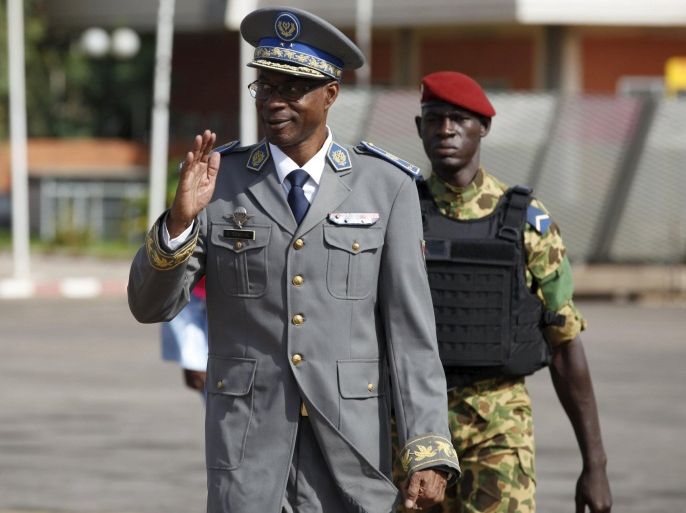 Burkina Faso's coup leader General Gilbert Diendere arrives at the airport to greet foreign heads of state in Ouagadougou, Burkina Faso, September 23, 2015. Following an emergency summit of the regional bloc ECOWAS in Nigeria on Tuesday, the presidents of Senegal, Togo, Benin, Ghana, Niger and Nigeria were to travel Burkina Faso on Wednesday to ensure that President Michel Kafando is reinstalled. REUTERS/Joe Penney