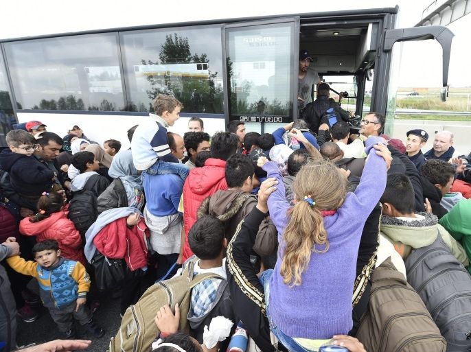 Refugees are brought from Nickelsdorf to Vienna by buses, 11 September 2015. The motorway is still closed for cars in direction to Vienna.