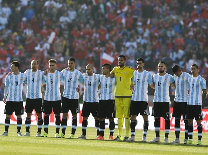 Argentina's team stand during the playing of the national anthems at the Copa America final soccer match at the National Stadium in Santiago, Chile, Saturday, July 4, 2015. (AP Photo/Ricardo Mazalan)