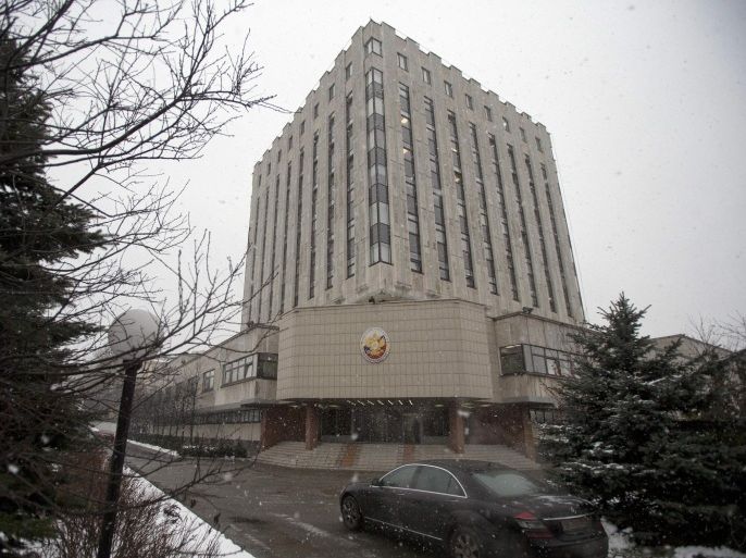 This photo taken Dec. 5, 2013 shows a car riding by the building of Rosoboronexport's headquarters in Moscow, Russia. To outfit Afghanistan’s security forces with new helicopters, the Pentagon bypassed U.S. companies and turned instead to Moscow for dozens of Russian Mi-17 rotorcraft at a cost of more than $1 billion. Senior Pentagon officials assured skeptical members of Congress they’d made the right call, pointing repeatedly to a top-secret 2010 study they said named the Mi-17 as the superior choice. (AP Photo/Pavel Golovkin)