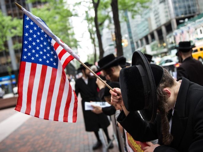 NEW YORK, NY - AUGUST 10: Anti-Zionist Orthodox Jews protest outside U.S. Sen. Chuck Schumer's Manhattan offices over his decision not to support President Obama's Iranian nuclear deal, which is currently being debated by Congress, on August 10, 2015 in New York City. Representatives of Iran, the U.S. and other nations involved in the talks reached an agreement that suppoters say would curb Tehran's nuclear activities, but which detractors believe would not while easing decades-long economic sanctions in the process.
