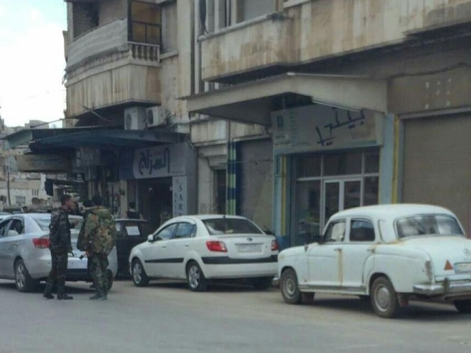 ‪‬ عناصر من قوات النظام في حماة(الجزيرة)