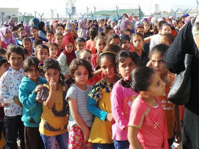 عودة التلاميذ إلى المدارس في مخيم الزعتري للاجئين السوريين بالأردن