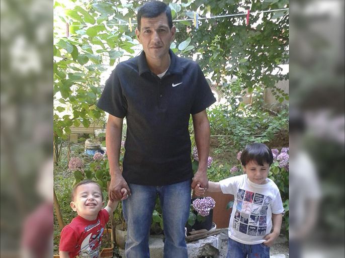 Abdullah Kurdi (C) poses with his sons Aylan (L) and Galip (R) in an undated photo provided by the Kurdi family. Abdullah Kurdi, distraught father of two Syrian toddlers who drowned with their mother and several other migrants as they tried to reach Greece identified their bodies on Thursday and prepared to take them back to their home town of Kobani. Aylan, 3, his brother, Galip, 5, and mother, Rehan, 35, were among 12 people, including other children, who died after two boats capsized while trying to reach the Greek island of Kos. REUTERS/Kurdi family/Handout via ReutersATTENTION EDITORS - THIS PICTURE WAS PROVIDED BY A THIRD PARTY. REUTERS IS UNABLE TO INDEPENDENTLY VERIFY THE AUTHENTICITY, CONTENT, LOCATION OR DATE OF THIS IMAGE. NO SALES. NO ARCHIVES. FOR EDITORIAL USE ONLY. NOT FOR SALE FOR MARKETING OR ADVERTISING CAMPAIGNS. THIS PICTURE IS DISTRIBUTED EXACTLY AS RECEIVED BY REUTERS, AS A SERVICE TO CLIENTS. TPX IMAGES OF THE DAY.