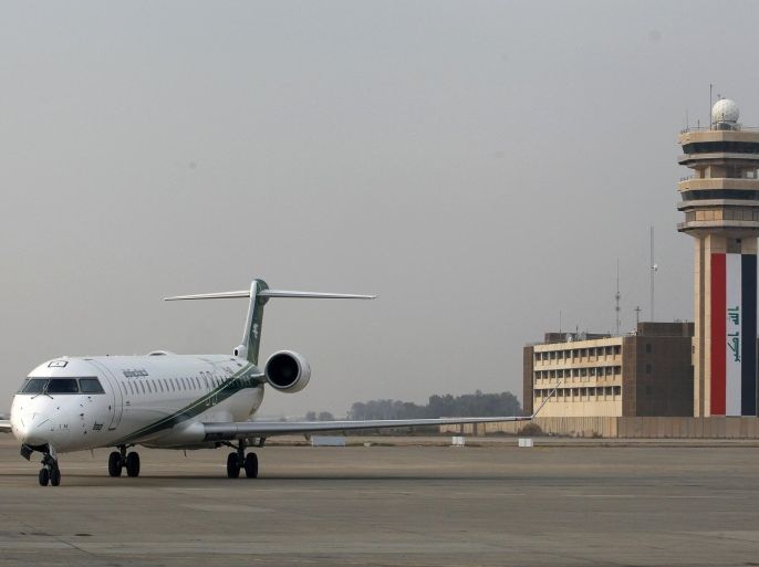 An Iraqi Airways plane lands at Baghdad International airport January 27, 2015. Airlines from at least three countries suspended flights to Baghdad on Tuesday after bullets hit an airplane operated by budget carrier Dubai Aviation Corp, known as flydubai, as it was landing at Baghdad airport. Company officials said Iraqi Airways and Iran's Caspian Airlines were operating flights to Baghdad on a normal schedule. REUTERS/Thaier Al-Sudani (IRAQ - Tags: CIVIL UNREST POLITICS TRANSPORT)