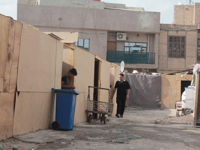 ‪‬ ترتفع نسب الفقر في العراق باستمرار مع غياب الدور الحكومي كما يقول المنتقدون(الجزيرة)
