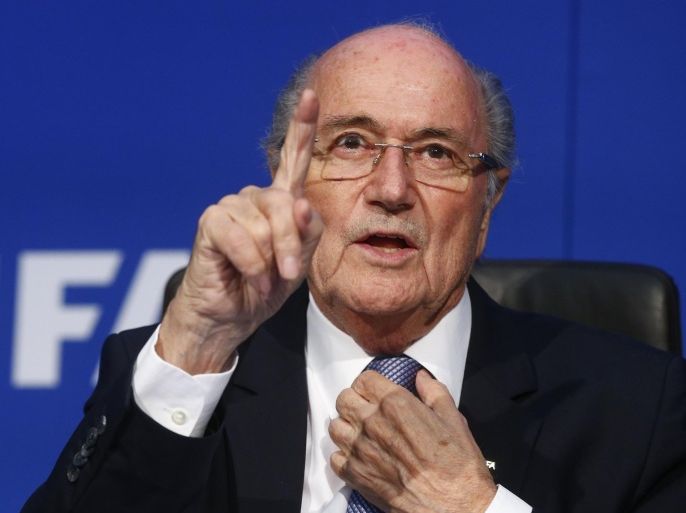FIFA President Sepp Blatter gestures during a news conference after the Extraordinary FIFA Executive Committee Meeting at the FIFA headquarters in Zurich, Switzerland in a July 20, 2015 file photo. The Coca-Cola Co called on Friday for FIFA's President Sepp Blatter to step down immediately following Swiss authorities saying they were opening a criminal investigation into the head of the world soccer body. REUTERS/Arnd Wiegmann/Files