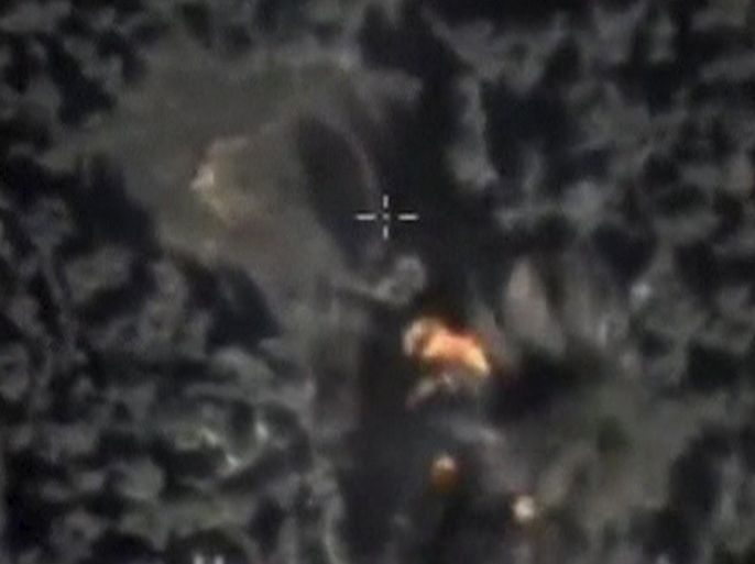 A frame grab taken from footage released by Russia's Defence Ministry October 5, 2015, shows airstrikes carried out by the country's air force in Syria. One of Iraq's most powerful Shi'ite Muslim militias said on Monday it fully supports Russia's intervention and air strikes against Islamic State in the Middle East and accused the United States of being indecisive in its campaign against the group. REUTERS/Ministry of Defence of the Russian Federation/Handout via Reuters ATTENTION EDITORS - FOR EDITORIAL USE ONLY. NOT FOR SALE FOR MARKETING OR ADVERTISING CAMPAIGNS. THIS IMAGE HAS BEEN SUPPLIED BY A THIRD PARTY. IT IS DISTRIBUTED, EXACTLY AS RECEIVED BY REUTERS, AS A SERVICE TO CLIENTS. REUTERS IS UNABLE TO INDEPENDENTLY VERIFY THE AUTHENTICITY, CONTENT, LOCATION OR DATE OF THIS IMAGE. FOR EDITORIAL USE ONLY. NO SALES.