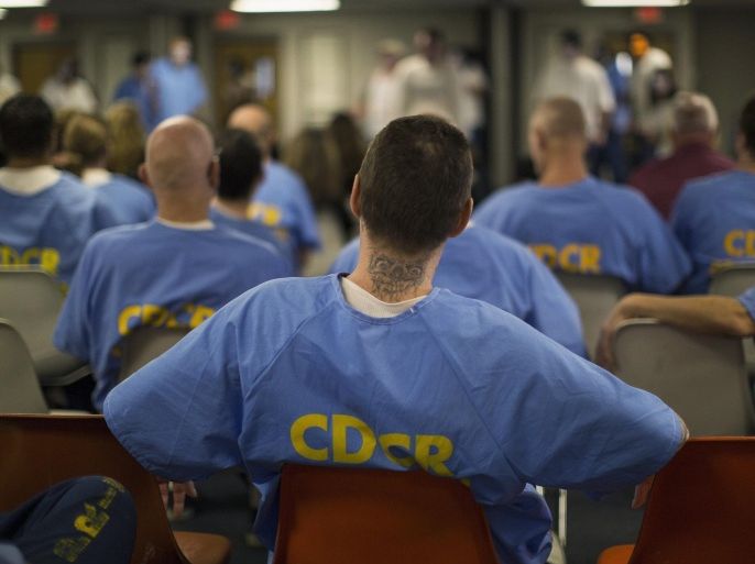 Inmates watch the workshop "Commedia Dell'Arte", part of the The Actors' Gang Prison Project program, at the California Rehabilitation Center in Norco, California in this September 30, 2014 file photo. California should shut down the state prison in Riverside County that is dilapidated, infested with vermin and expensive to operate, the chairwoman of the state Senate's public safety panel said on May 12, 2015. To match USA-CALIFORNIA/PRISONS REUTERS/Mario Anzuoni/Files