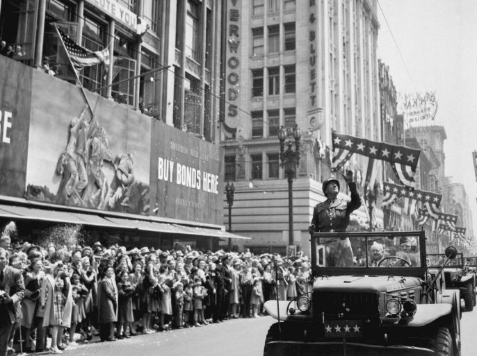 U.S. Army General George S. Patton acknowledges the cheers of the welcoming crowds during his visit in Los Angeles, California, on June 9, 1945, in this handout photo provided by the United States National Archives and Records Administration. Seventy years ago, following the suicide of Nazi leader Adolf Hitler, Germany's head of state Karl Donitz signed his country's surrender to Allied forces in Reims, France on May 7, 1945 and in Berlin on May 8, 1945. REUTERS/United States National Archives and Records Administration/Handout FOR EDITORIAL USE ONLY. NOT FOR SALE FOR MARKETING OR ADVERTISING CAMPAIGNS. THIS IMAGE HAS BEEN SUPPLIED BY A THIRD PARTY. IT IS DISTRIBUTED, EXACTLY AS RECEIVED BY REUTERS, AS A SERVICE TO CLIENTS