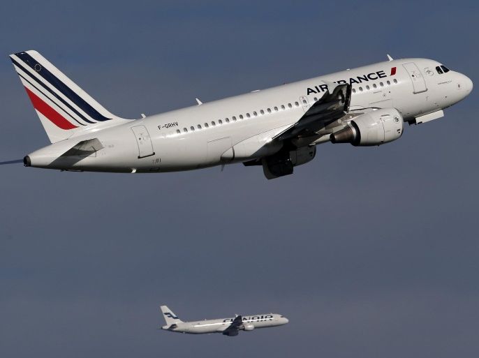 An Air France Airbus A319 aircraft takes off at the Charles de Gaulle International Airport in Roissy, near Paris, October 27, 2015. The French unit of Air France-KLM will stick to the use of purely voluntary redundancies, currently estimated at 1,000 in 2016, if it can reach an accord with unions by January. Air France-KLM will report its third-quarter results on October 29. REUTERS/Christian Hartmann