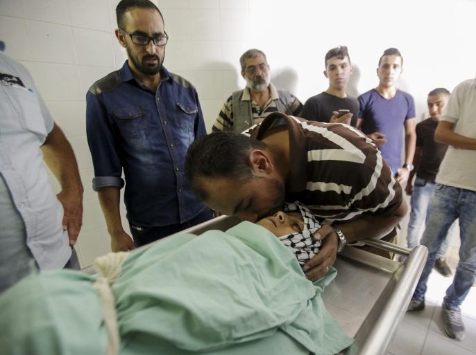 Family members of 13-years-old Palestinian Abdulrahman Mustafa from Aida refugee camp, mourn his death at at the hospital in the West Bank city of Bethlehem, 05 October 2015. Mustafa was killed by Israeli soldiers during clashes next to Rachel tomb, in Bethlehem due the tension over the West Bank and the security measures imposed by Israel on the Palestinian territories.