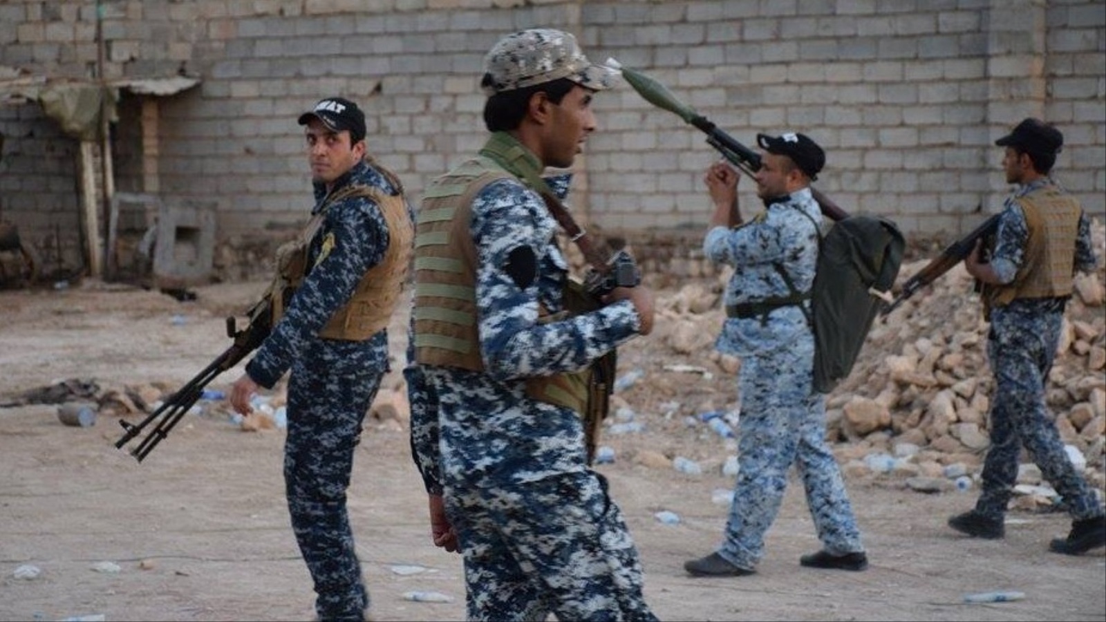 جنود من الشرطة الاتحادية العراقية في محافظة الأنبار (الجزيرة)