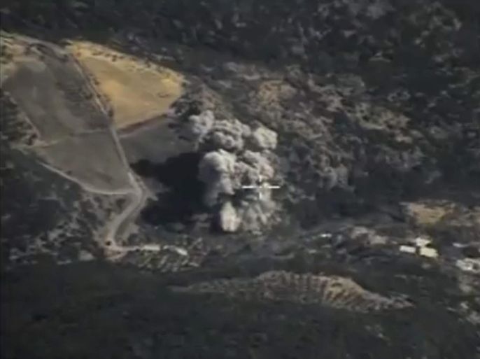 A handout frame grab taken from a video footage made available on the official website of the Russian Defence Ministry on 05 October 2015 shows an aerial view of a srike carried out by Russian warplanes against so-called Islamic State (ISIS or IS) facilities in the mountainous area in 13 km to the west from Jisr al-Shughour in Idlib province, Syria, 04 October 2015. Russia said last week it had begun airstrikes against Islamic State in Syria, and claims its efforts have significantly weakened the al-Qaeda splinter group. EPA/RUSSIAN DEFENCE MINISTRY PRESS SERVICE/HANDOUT