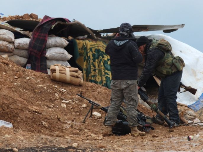 عناصر جيش الفتح على إحدى جبهات ريف حماة 2015