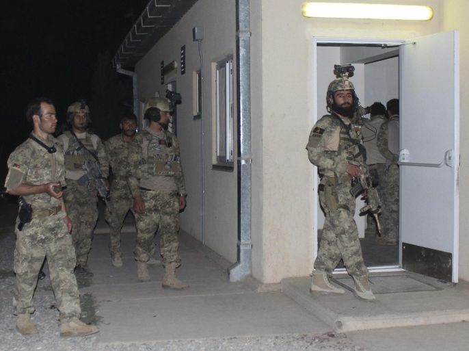 A picture made available on 01 October 2015 shows Afghan special forces preparing to launch a counter-offensive to regain control of Kunduz, at the fortified Kunduz airport, Afghanistan, 30 September 2015. Taliban forces pressed their advantage in the key northern city of Kunduz on 30 September, launching further assaults on government forces and ambushing reinforcements sent from the capital, officials said. They also captured a military base on the outskirts of the city, two days after taking Kunduz itself, the capital of the strategic province with the same name. Kunduz was the first major city to be taken by the Taliban in the 14 years of conflict that has followed their ouster in a 2001 US-led invasion. The city's fall highlights the Islamist movement's ability to mount large operations away from its rural strongholds. EPA/NAJIM RAHIM ALTERNATIVE CROP