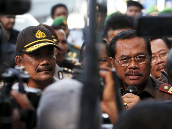 Indonesia Attorney General H.M. Prasetyo (R) talks to reporters beside Police Chief Badrodin Haiti at Wijayapura port near the prison island of Nusakambangan in Cilacap, Central Java, Indonesia, April 29, 2015. An Indonesian firing squad executed eight drug traffickers, including seven foreigners, in the early hours of Wednesday, sparking condemnation from Australia and Brazil who had made final, desperate pleas to save their nationals. REUTERS/Beawiharta