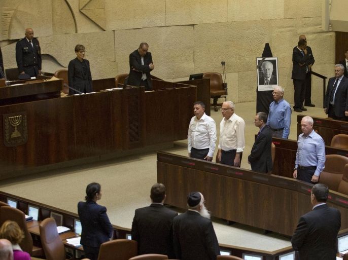 Knesset Members observe a moment of silence during an event to commemorate the 20th anniversary of the assassination of the late Prime Minister Yitzhak Rabin at the Knesset (Parliament) in Jerusalem, Israel, 26 October 2015. Israel on 25 October 2015 began commemorations of the 20th anniversary of Rabin's assassination on 04 November 1995. Rabin was assassinated by an Israeli right-wing extremist who opposed his concessions for peace with the Palestinians.