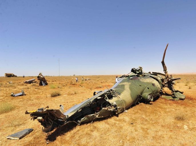 A view of the wreckage of a Mi-35 attack helicopter in Benghazi July 4, 2013. Two crew members were killed after the helicopter crashed during a flight for a graduation ceremony at Benina airbase. REUTERS/Esam Al-Fetori (LIBYA - Tags: MILITARY TRANSPORT DISASTER)
