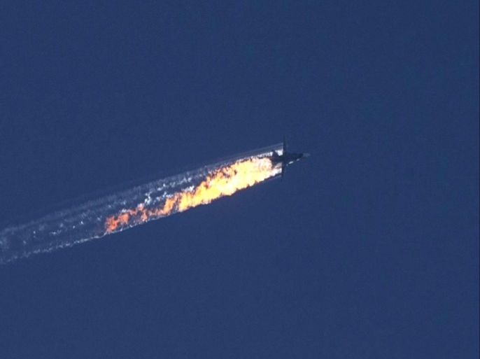 A still image made available on 24 November 2015 from video footage shown by the HaberTurk TV Channel shows a burning trail as a plane comes down after being shot down near the Turkish-Syrian border, over north Syria, 24 November 2015. A Russian fighter jet was shot down 24 November over the Turkish-Syrian border, the Defence Ministry in Moscow said, according to Interfax news agency. The Sukhoi Su-24 was reportedly downed by Turkish forces, Turkish state news agency Anadolu reported, citing sources in the presidency. The report said that the jet violated Turkish airspace and ignored warnings. It crashed in the north-western Syrian town of Bayirbucak, Turkish security sources were quoted as saying. EPA/HABERTURK TV CHANNEL MANDATORY CREDIT: HABERTURK TV CHANNEL