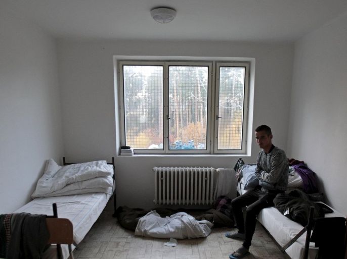 A migrant sits in his room in the facility for detention of foreigners in Bela-Jezova, Czech Republic, November 5, 2015. Czech authorities moved the immigrants to improve the conditions in which migrants were held in the detention centres after the country faced criticism from the UN Commissioner for Human Rights and non-government organisations, according to local media. REUTERS/David W Cerny
