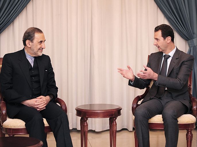 DAM222 - Damascus, -, SYRIA : A handout picture released by the official Syrian Arab News Agency (SANA) on November 29, 2015 shows President Bashar al-Assad (R) meeting with Iran’s Supreme Leader’s advisor Ali Akbar Velayati in the Syrian capital Damascus . AFP PHOTO / HO / SANA == RESTRICTED TO EDITORIAL USE - MANDATORY CREDIT "AFP PHOTO / HO / SANA" - NO MARKETING NO ADVERTISING CAMPAIGNS - DISTRIBUTED AS A SERVICE TO CLIENTS ==