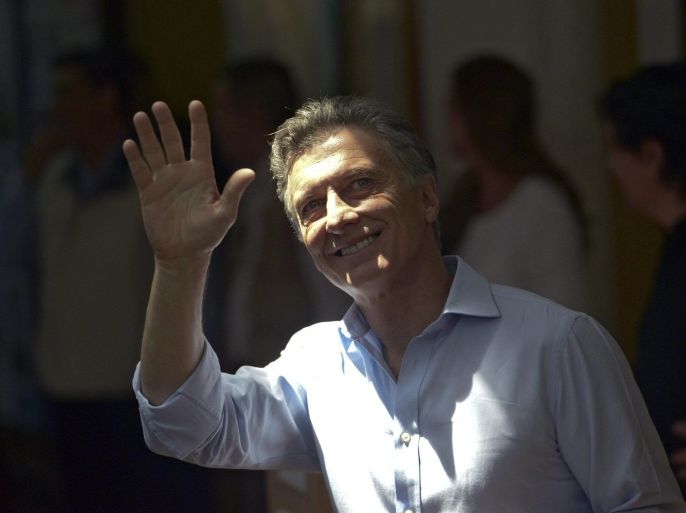 Argentinian opposition presidential candidate of Alianza Cambiemos Mauricio Macri waves after casting his vote as Argentina is holding its first presidential run-off election, in Buenos Aires, Argentina, 22 November 2015. Some 32 million people are eligible to cast ballots in the run-off, which pits conservative Mauricio Macri, of the opposition Cambiemos coalition and the frontrunner in polls heading into the election, against Peronist Daniel Scioli, the candidate of the ruling Front for Victory.