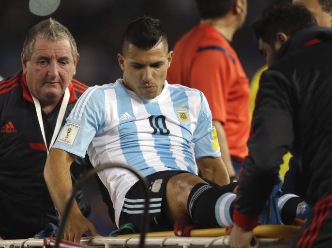 Argentina's Sergio Aguero is carried off the filed after an injury during a 2018 Russia World Cup qualifying soccer match against Ecuador in Buenos Aires, Argentina, Thursday, Oct. 8, 2015. (AP Photo/Natacha Pisarenko)