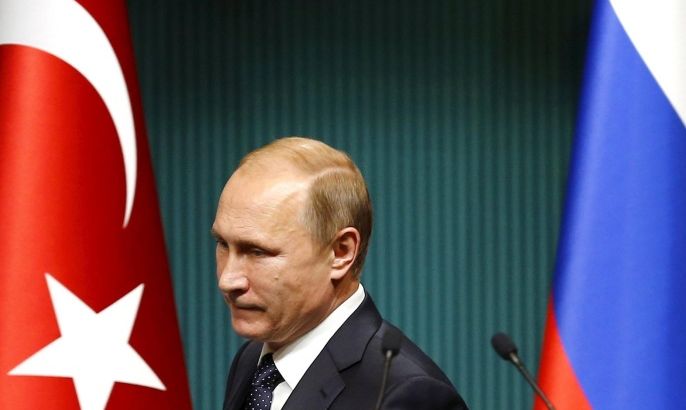 Russian President Vladimir Putin arrives for a news conference at the Presidential Palace in Ankara, Turkey in this December 1, 2014 file photo. Putin signed a decree imposing economic sanctions against Turkey on Saturday, four days after Turkey shot down a Russian warplane near the Syrian-Turkish border. REUTERS/Umit Bektas/Files