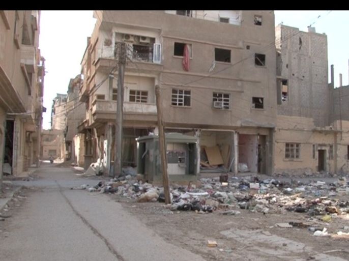 أحد الأحياء التي يسيطر عليه النظام السوري داخل مدينة دير الزور