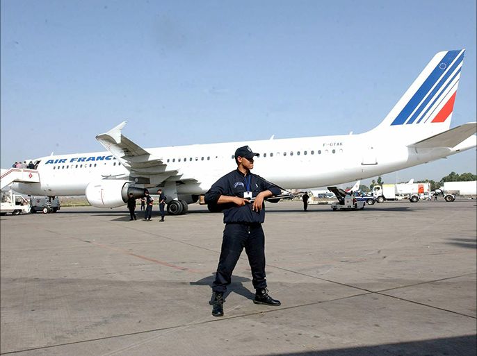 cSeCurity is tight as the first commecial flight of Air France lands at Houari Bourmediene airport in Algiers Saturday 28, June 2003. Air France suspended flights to Algeria following a bloody hostage crisis which left three dead in Decmber 1994. EPA