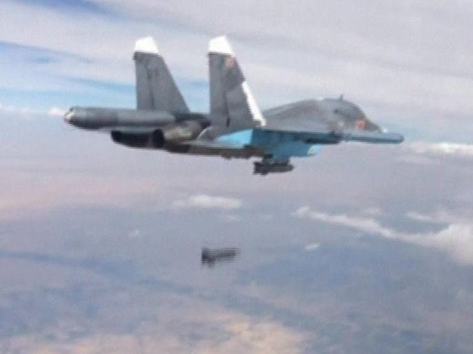 A frame grab taken from footage released by Russia's Defence Ministry October 9, 2015, shows a Russian Su-34 fighter-bomber dropping a bomb in the air over Syria. Russia's air force hit 60 Islamic State targets in Syria over the past 24 hours and killed around 300 militants, the Defence Ministry said on Friday, in Moscow's most intense raids yet since it first launched strikes on Syria 10 days ago. REUTERS/Ministry of Defence of the Russian Federation/Handout via Reuters ATTENTION EDITORS - FOR EDITORIAL USE ONLY. NOT FOR SALE FOR MARKETING OR ADVERTISING CAMPAIGNS. THIS IMAGE HAS BEEN SUPPLIED BY A THIRD PARTY. IT IS DISTRIBUTED, EXACTLY AS RECEIVED BY REUTERS, AS A SERVICE TO CLIENTS. REUTERS IS UNABLE TO INDEPENDENTLY VERIFY THE AUTHENTICITY, CONTENT, LOCATION OR DATE OF THIS IMAGE. FOR EDITORIAL USE ONLY. NO SALES.