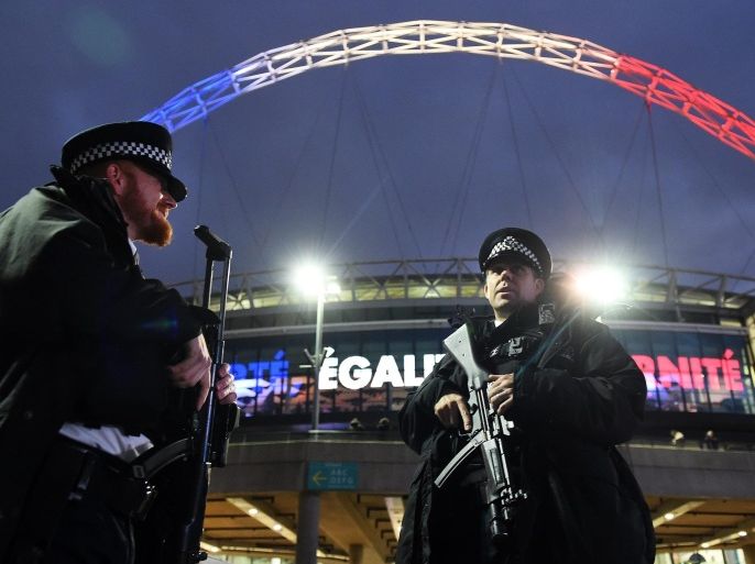 Armed police on patrol outside Wembley Stadium ahead of the international soccer friendly match between England and France in London, Britain, 17 November 2015. Security has been stepped up ahead of the match following the terror attacks in Paris 13 November.