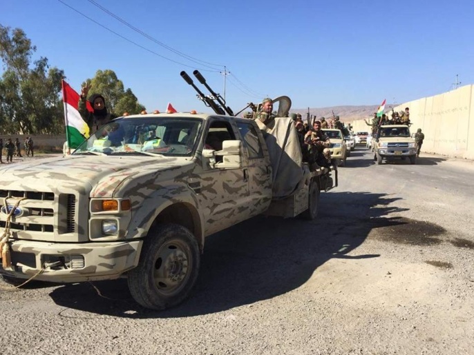 قوات من البشمركة الكردية في قضاء سنجار (الجزيرة)