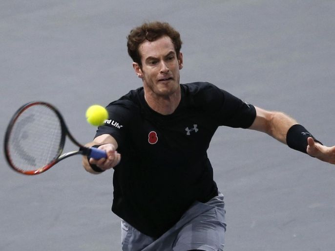 Britain's Andy Murray returns the ball to Borna Coric of Croatia, during their second round match of the BNP Masters tennis tournament, at the Paris refurbished Bercy Arena, in Paris, France, Wednesday, Nov. 4, 2015. (AP Photo/Francois Mori)