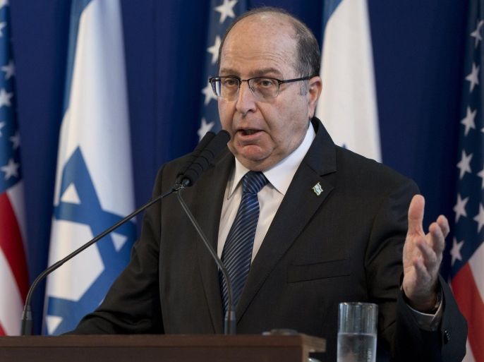Israeli Defense Minister Moshe Ya'alon speaks during a joint news conference with U.S. Defense Secretary Ash Carter at Israel's Defense Force headquarters in Tel Aviv, Israel, Monday, July 20, 2015. Carter was warmly welcomed Ya'alon Monday on the first Cabinet-level U.S. visit to the Jewish state since the Iran nuclear deal was announced. (AP Photo/Carolyn Kaster, Pool)