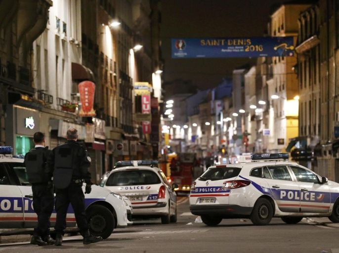 French police secure the area as shots are exchanged in Saint-Denis, France, near Paris, November 18, 2015 during an operation to catch fugitives from Friday night's deadly attacks in the French capital. REUTERS/Benoit Tessier