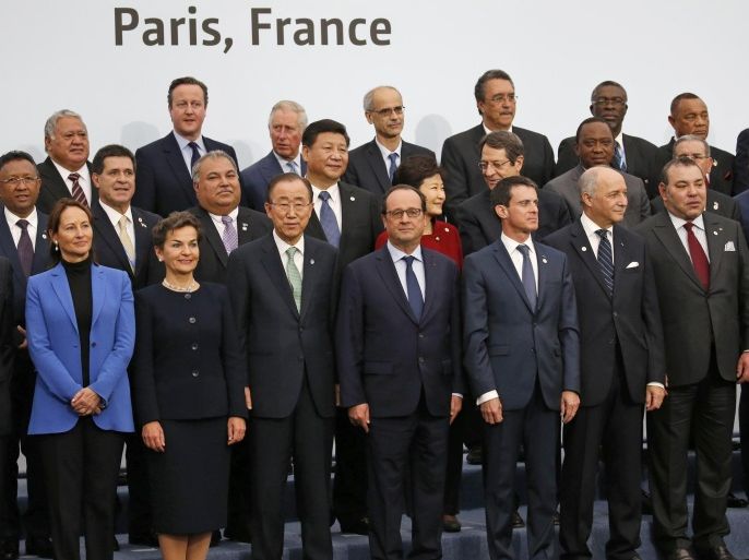 World leaders pose for a group photo at the COP21, United Nations Climate Change Conference, in Le Bourget, outside Paris, Monday, Nov. 30, 2015. (AP Photo/Jacky Naegelen, Pool)