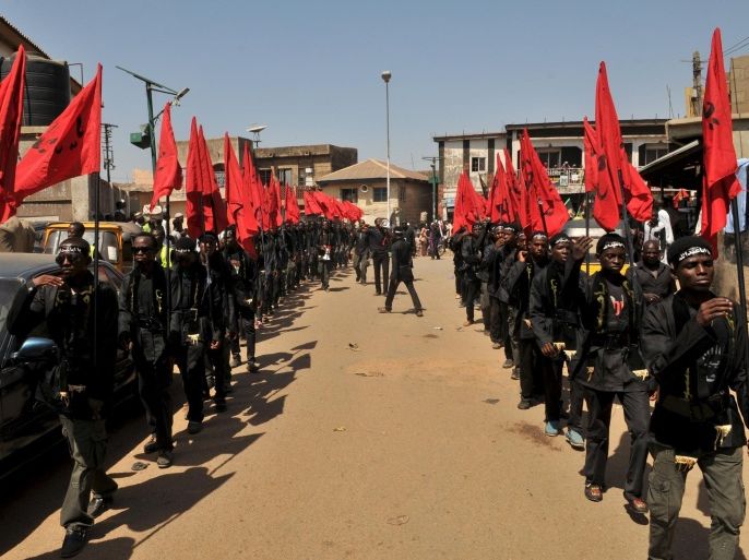 Shi'ite Muslims take part in a rally to commemorate Ashura in Kano, Nigeria October 24, 2015. Ashura, which falls on the 10th day of the Islamic month of Muharram, commemorates the death of Imam Hussein, grandson of Prophet Mohammad, who was killed in the seventh century battle of Kerbala. REUTERS/Stringer